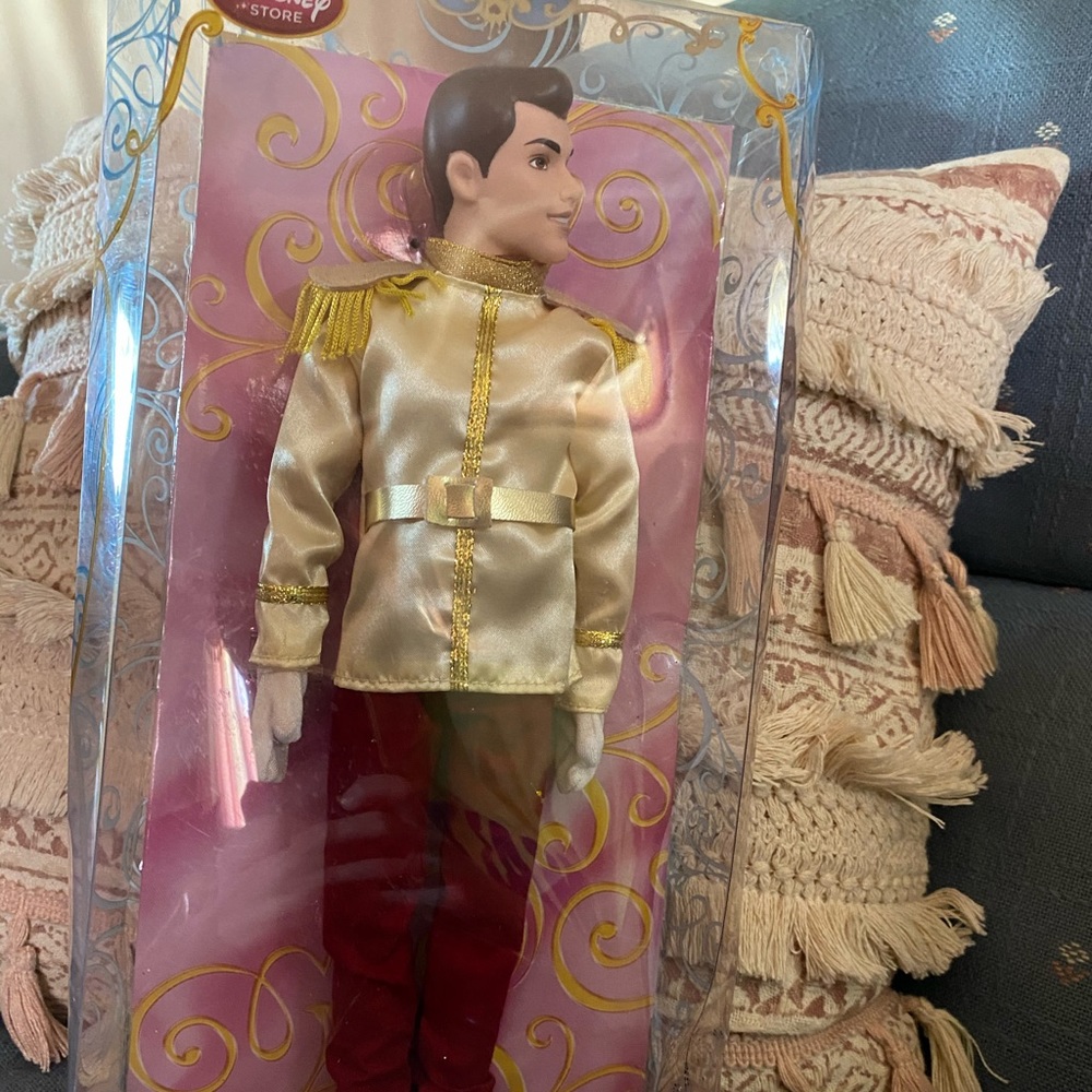 A collectible Disney prince charming doll